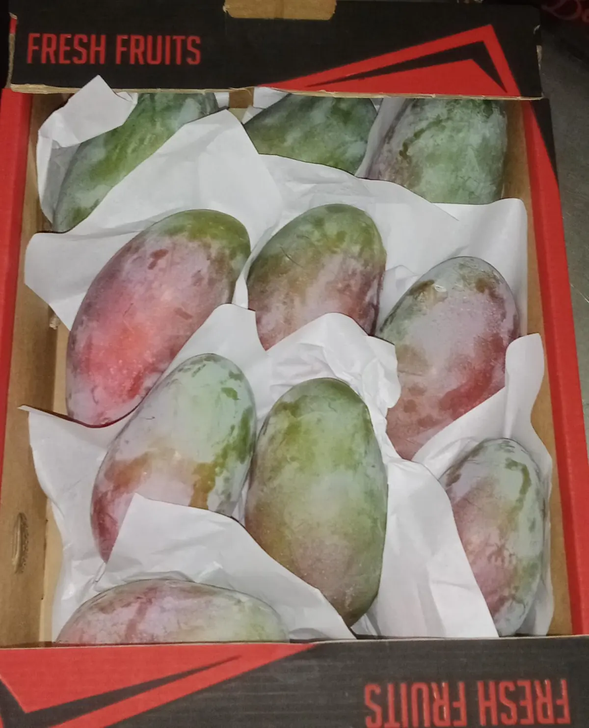 Close view of packed mangoes